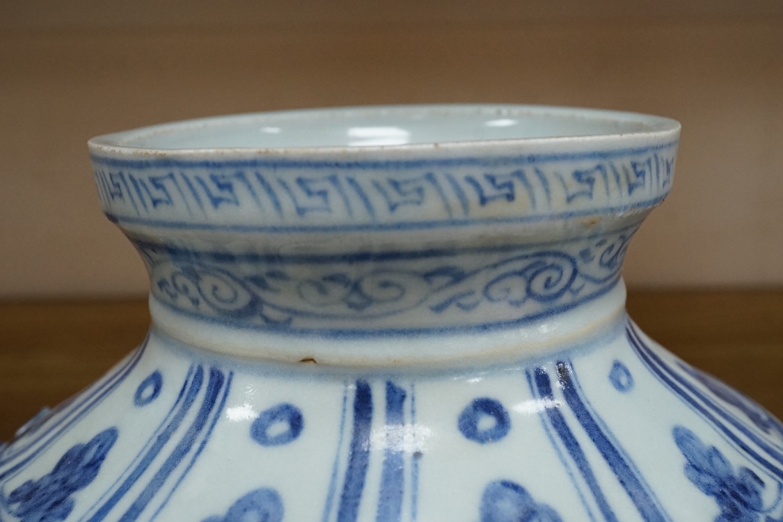 A Chinese blue and white bulbous jar hand painted with animals, 28cm high